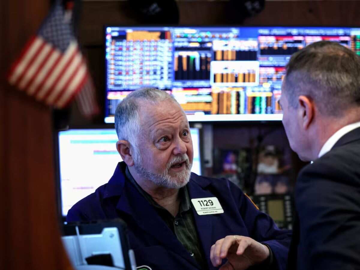 S&P 500 ends higher as markets weigh rising yields, upbeat corporate