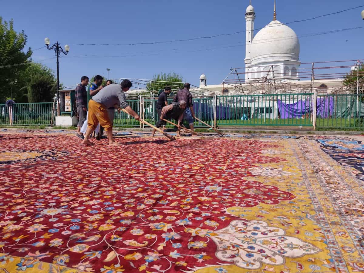 Kashmir’s carpet artisans claim to have made Asia’s largest hand-knotted carpet