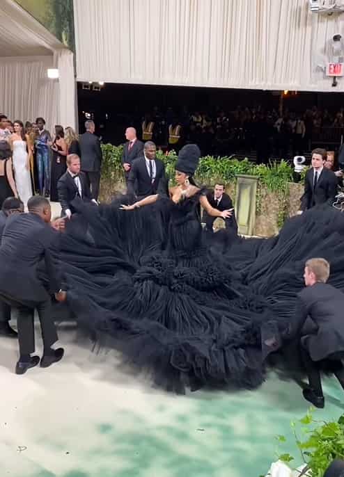 Cardi B walks in a big black tulle gown