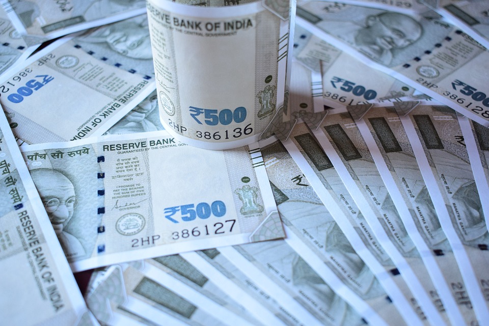 Rupee slips by 5 paise to close at