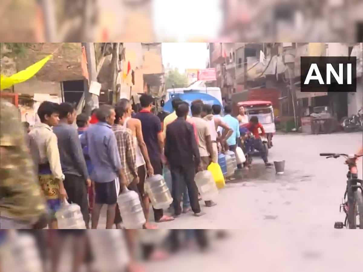 Delhi water crisis: Long queues continue to form at tankers across the city