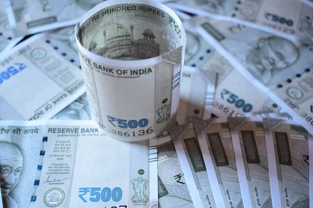 Currency Market News: Rupee opens on a flat note at 83.50 vs dollar