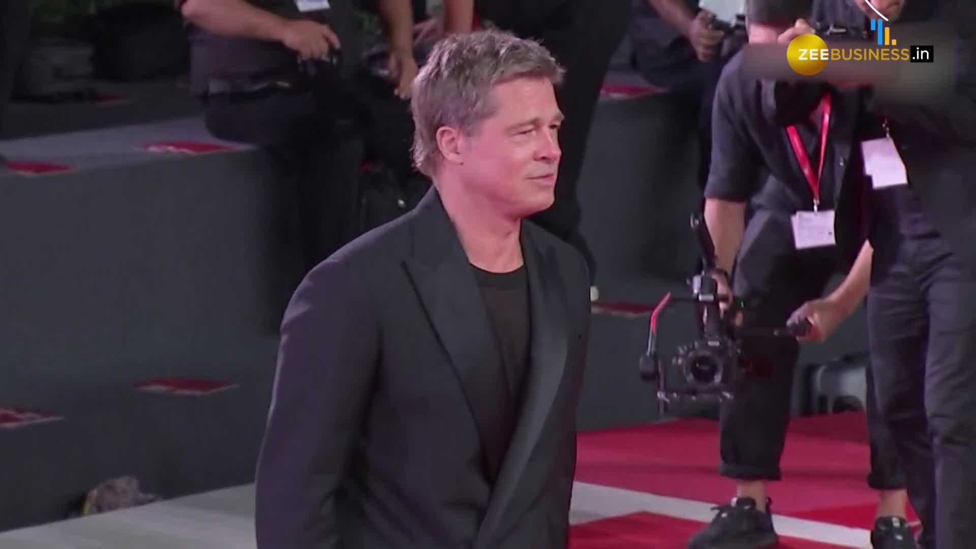 Brad Pitt and Clooney set Venice red carpet alight at 'Wolfs