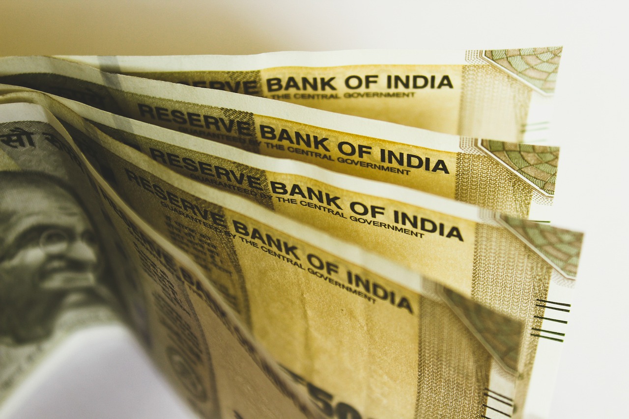 Currency Update: Rupee settles flat at 83.99 against US dollar