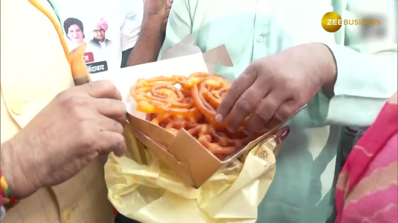 Congress Celebrates Early Poll Success