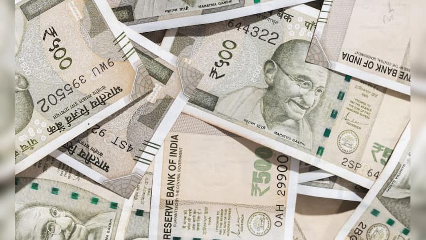 Rupee settles on flat note, rises 1 paisa to 84.07 against US dollar 