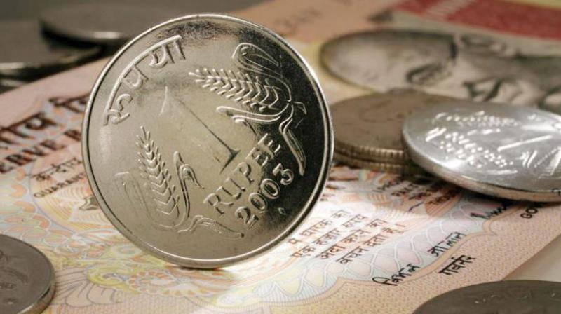 Rupee ends at record low of 84.76 vs dollar