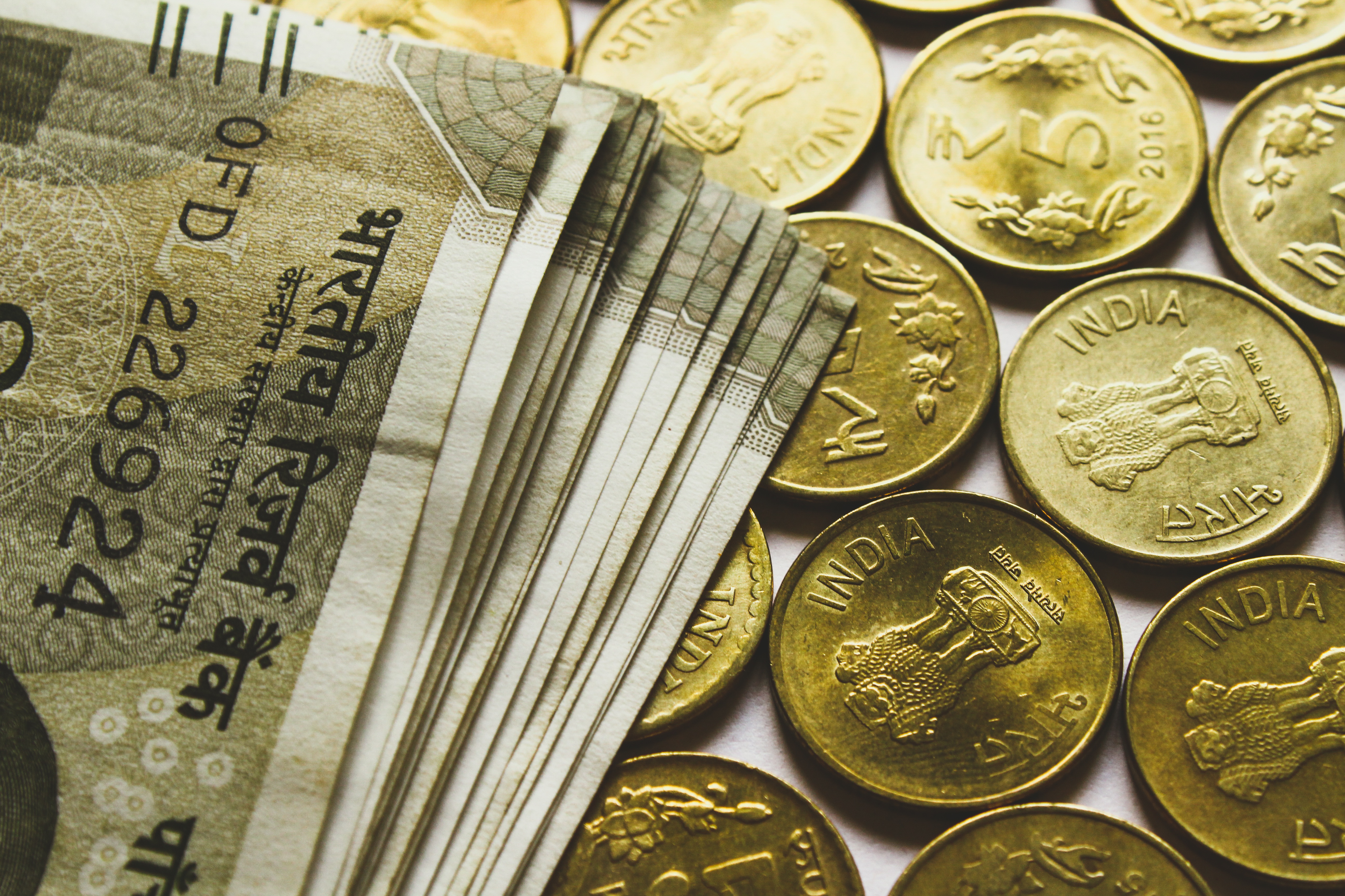 Rupee rises 5 paise to close at 86.55 against US dollar