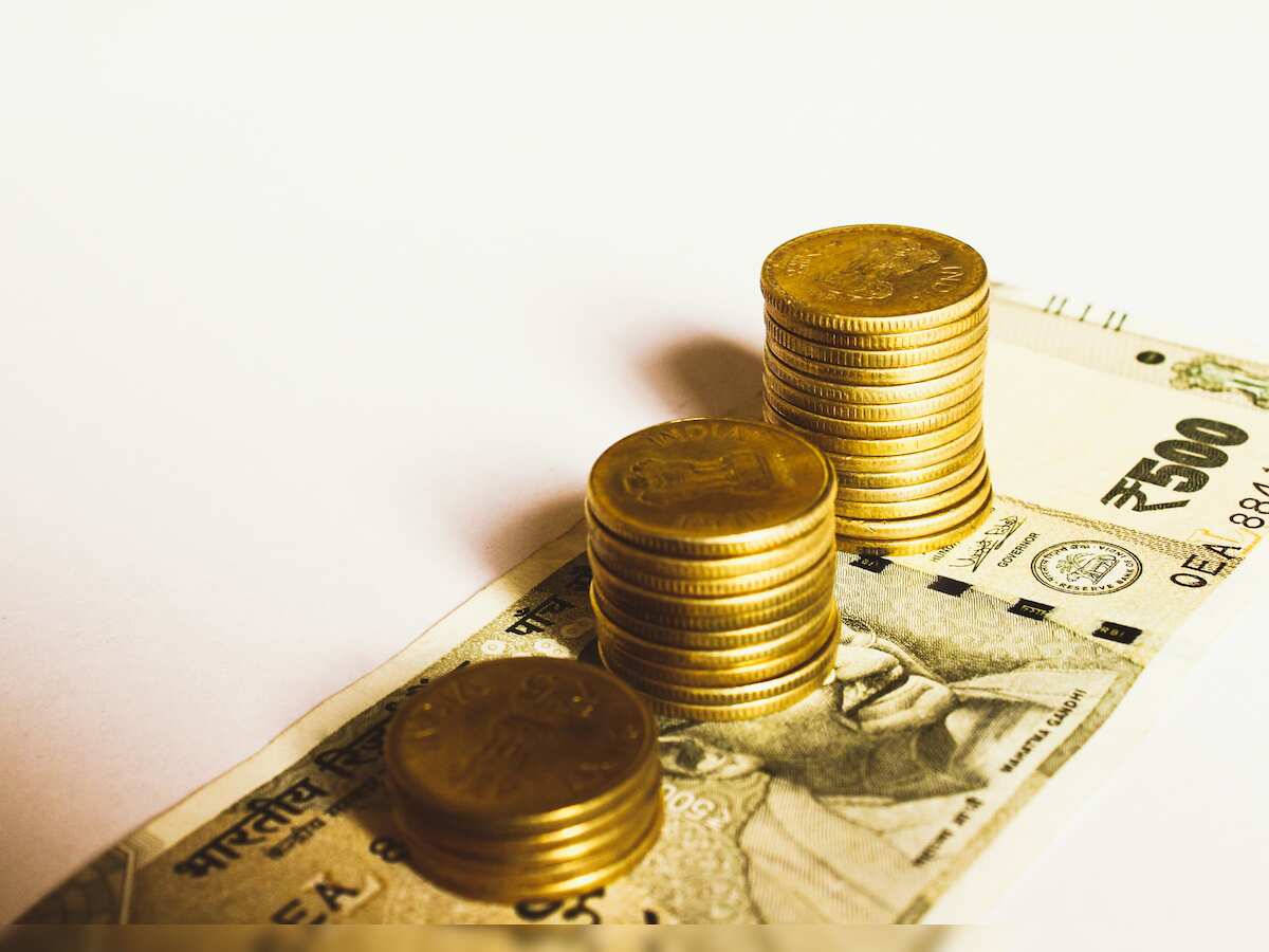 Rupee falls 14 paise to close at 86.59 against US dollar 