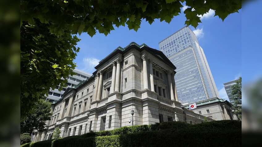   Bank of Japan raises interest rate to about 0.5%, citing higher wages, inflation