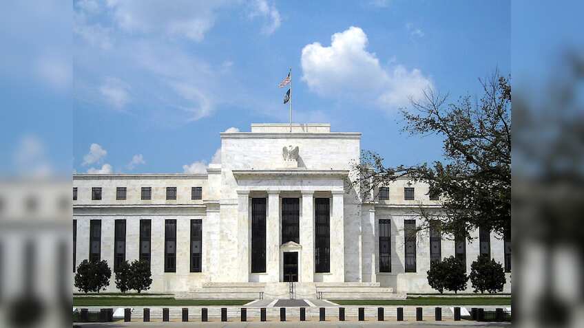 Federal Reserve holds interest rates steady, cites 'solid' job market and persistent inflation