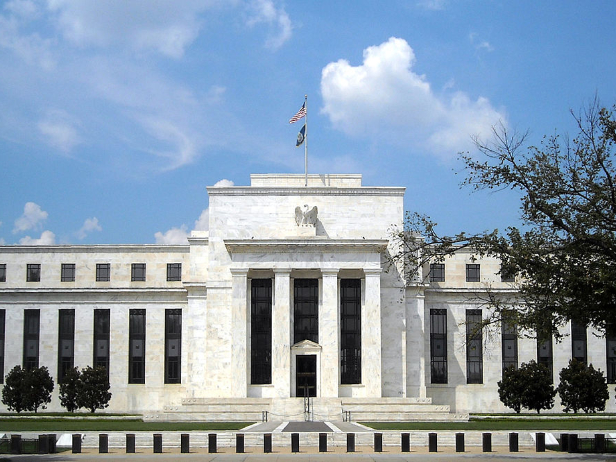 Federal Reserve holds interest rates steady, cites 'solid' job market and persistent inflation