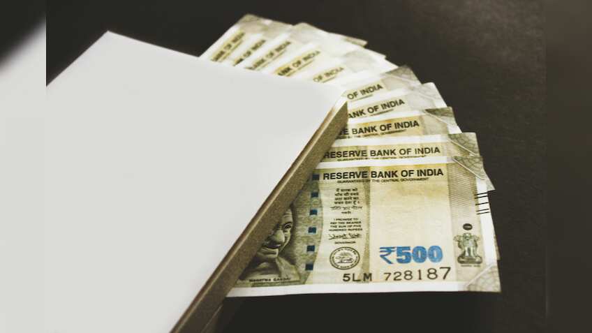 Rupee plunges 14 paise to close at record low of 87.57 against US dollar 