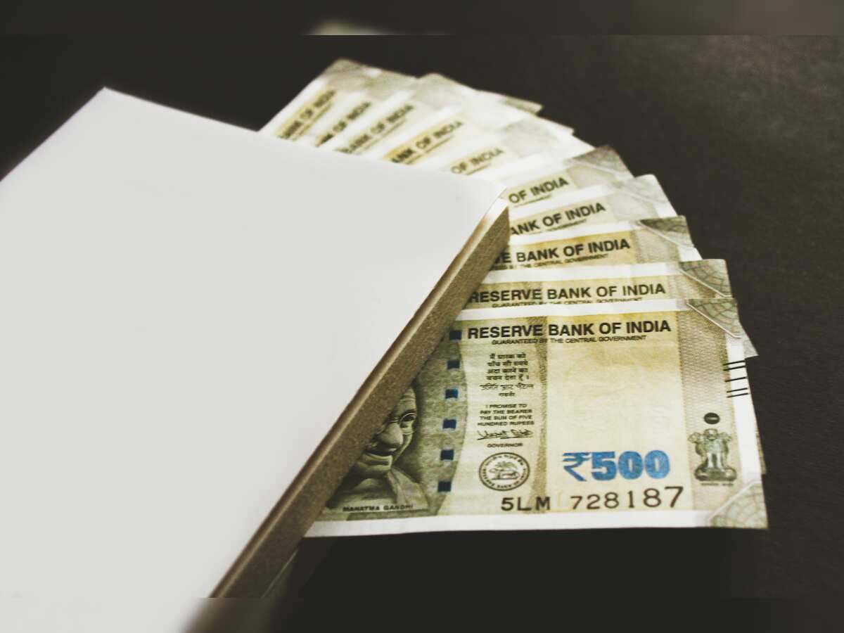 Rupee plunges 14 paise to close at record low of 87.57 against US dollar 