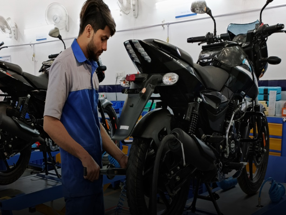 Bajaj Auto rises after board clears Rs 1,500