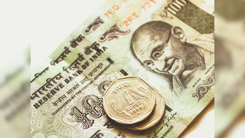 Rupee opens weaker at Rs 87.97 against dollar after US Fed rate cut