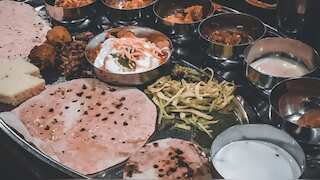 Costs of veg, non-veg thalis dip 13% in November amid easing vegetable prices: Crisil