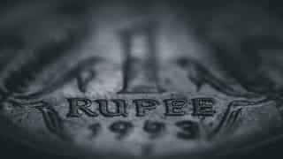 Rupee falls 40 paise to close at record low of 90.37 vs dollar