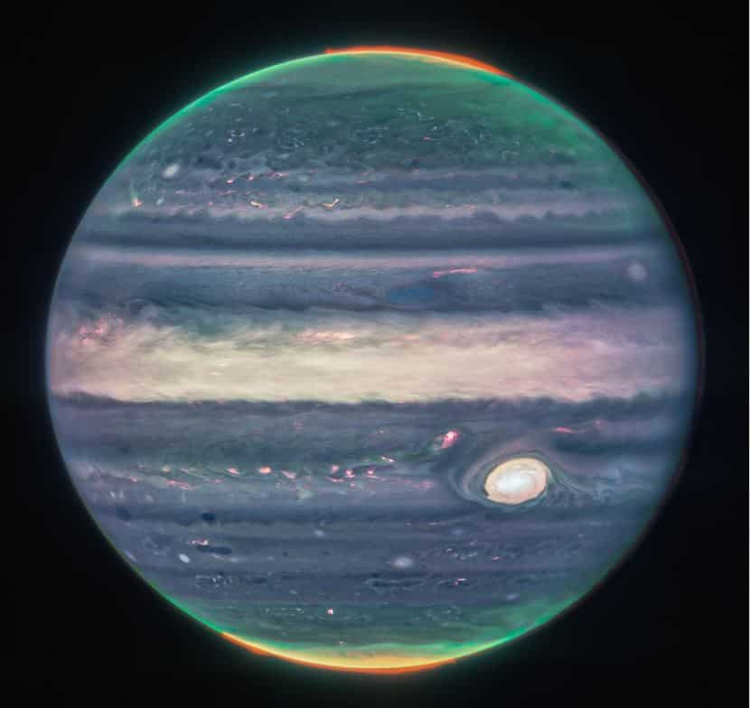 Webb NIRCam composite image of Jupiter from three filters – F360M (red), F212N (yellow-green), and F150W2 (cyan) – and alignment due to the planet’s rotation. (Source: NASA)