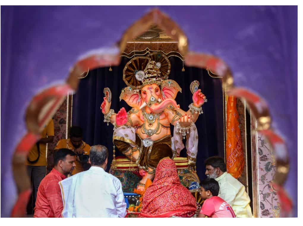 Beawar: Devotees worship Lord Ganesh at a pandal on the occasion of Ganesh Chaturthi festival in Beawar, Wednesday, Aug 31, 2022. (PTI Photo)