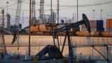 Crude oil futures rise on weaker dollar, new cash inflows 