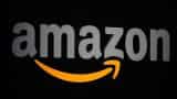Amazon delivers profit, stock surges 12%