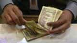Rupee opens 8 paise lower against dollar at 66.41