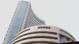 Sensex tanks 210 points on rout in Japan; Nifty below 7,800