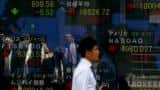 Asian shares near 10-week lows; dollar bounces on US Fed rate view