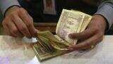 Rupee gains 4 paise against dollar in early trade 