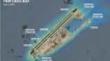 Did China build reinforced hangars on disputed islands?
