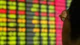 Asian shares ease taking cue from Wall Street, oil slips