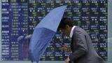 Asian shares edge up as investors await policy decision in Australia