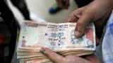 Opposition parties slam government's move to abolish large currency notes