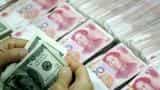 China weakens yuan-dollar rate beyond landmark 6.8 level