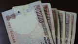 Rupee cracks 67-mark, tanks 52 paise against dollar