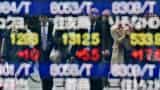 Oil prices fall further in Asia, yen gains hit Tokyo