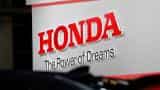 Japan's Honda ties up with ride-hailing service Grab