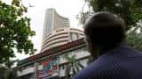 Sensex closed negative for 7th day, tumbles 263 points on earnings&#039; worries