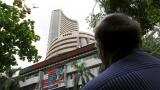Sensex closed negative for 7th day, tumbles 263 points on earnings' worries