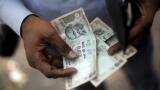 Kotak Mahindra Bank cut base rate by 10 bps, shares trade high