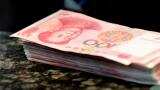 China banks extend record 12.65 trillion yuan in loans in 2016 as debt worries mount