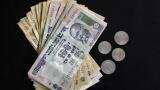 Rupee weakens more, loses 12 paise against dollar