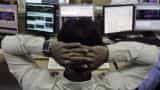 Sensex, Nifty open flat as investors remain cautious ahead of US Fed announcements