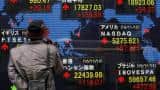 Asia stocks ride global momentum, dollar up on June Fed rate hike bets