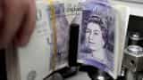 Sterling retreats after Manchester blast, stocks steady