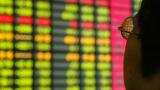 Asia stocks pressured by Wall Street losses, dollar sags