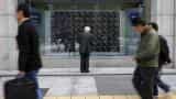 Asian shares flat, Fed hike expectations underpin dollar