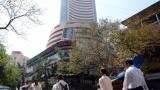 Sensex, Nifty end flat in choppy trade; auto, banks slip