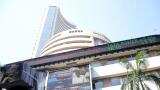 Sensex trades flat, Nifty holds above 10,800; YES Bank top gainer